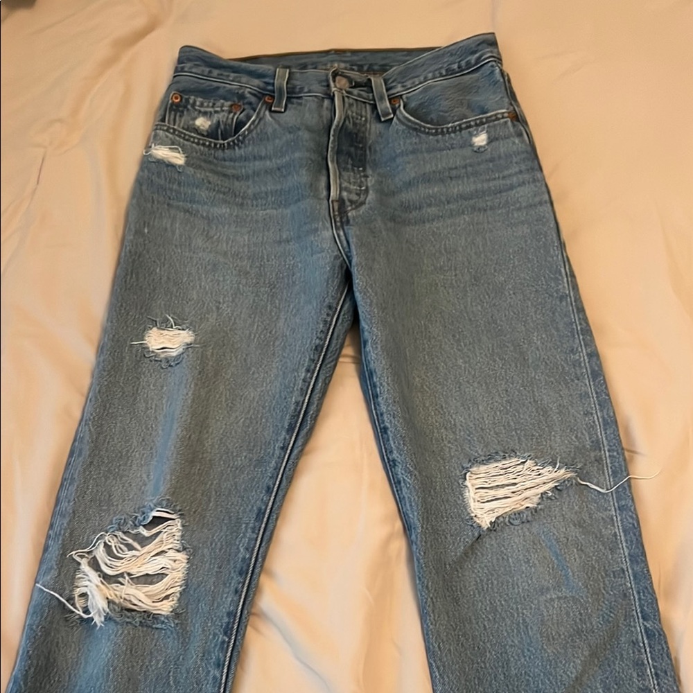 Distressed Blue Levi Jeans